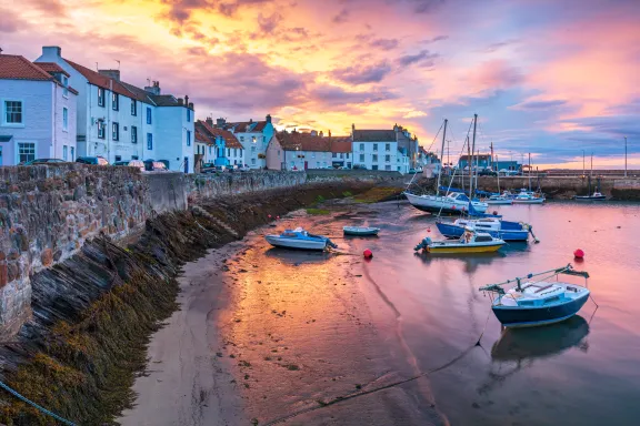 A stunning sunrise over St Monans village harbour in Fife, Scotland